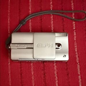 Canon Silver ELPH camera with Strap untested